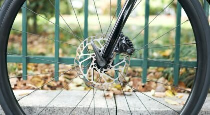Detailed view of a bicycle wheel featuring a modern disc brake. Ideal for cycling enthusiasts and technology.