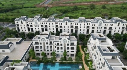 Aerial shot of luxury apartment buildings and a pool in Đồng Nai, Vietnam.