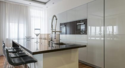 Stylish modern kitchen with an island and sleek cabinetry, perfect for contemporary living.