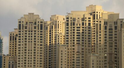 A close-up view of modern high-rise buildings in Dubai Marina, showcasing architectural detail and luxury living.