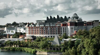 A stunning view of Resort World Sentosa Singapore with lush greenery and distinctive architecture.