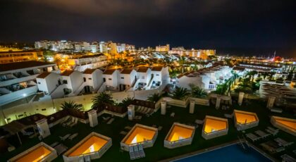 Captivating night view of a luxury hotel and surrounding villas in Tenerife, Spain.