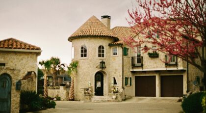 Stone-built Mediterranean style house with lush surroundings in Dallas, Texas.